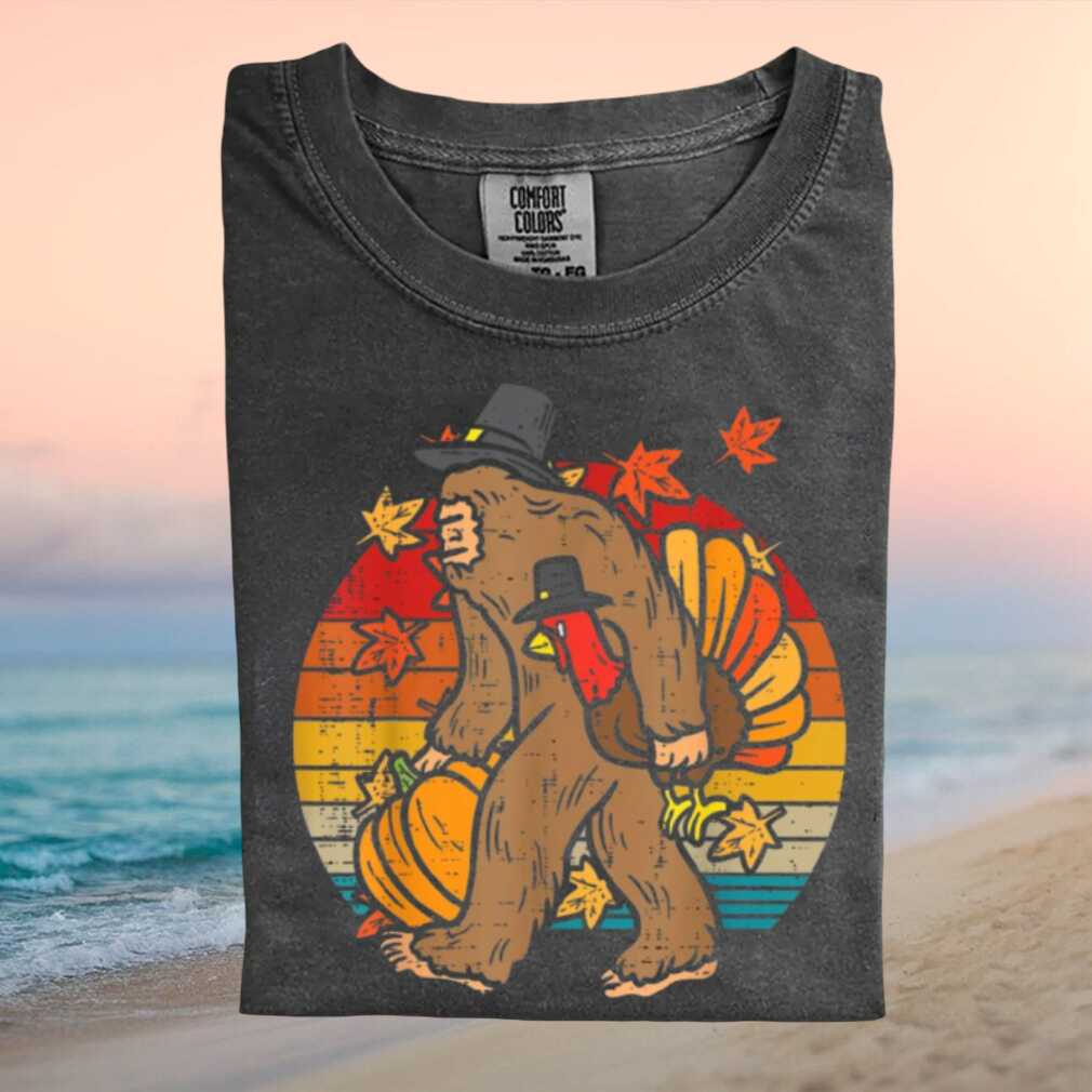 Bigfoot Holding Turkey Thanksgiving Retro Style T Shirt - Limotees LLC
