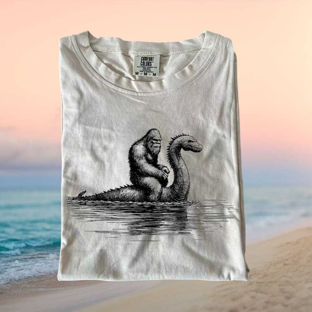 Bigfoot Riding Loch Ness Monster Cryptid Humor Graphic T Shirt - Limotees LLC