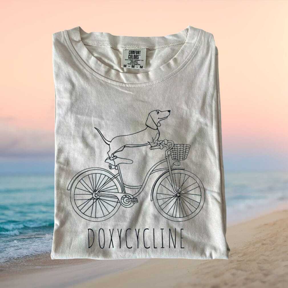 Doxycycline Dachshund Dog On Bicycle Pun T Shirt - Limotees LLC