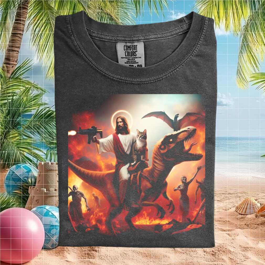 Jesus Riding Dinosaur With Cat Fire Hell Meme Graphic T Shirt - Limotees LLC