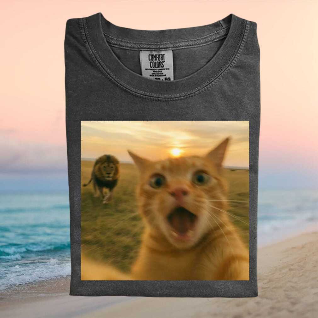 Lion Chasing Cat Funny Viral Meme Graphic T Shirt - Limotees LLC